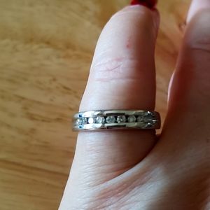 10kt white gold wedding band with diamonds.